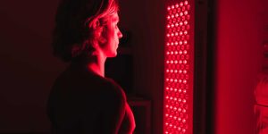 Person using Red Light Therapy to help them overcome drug addiction at Peachtree Recovery